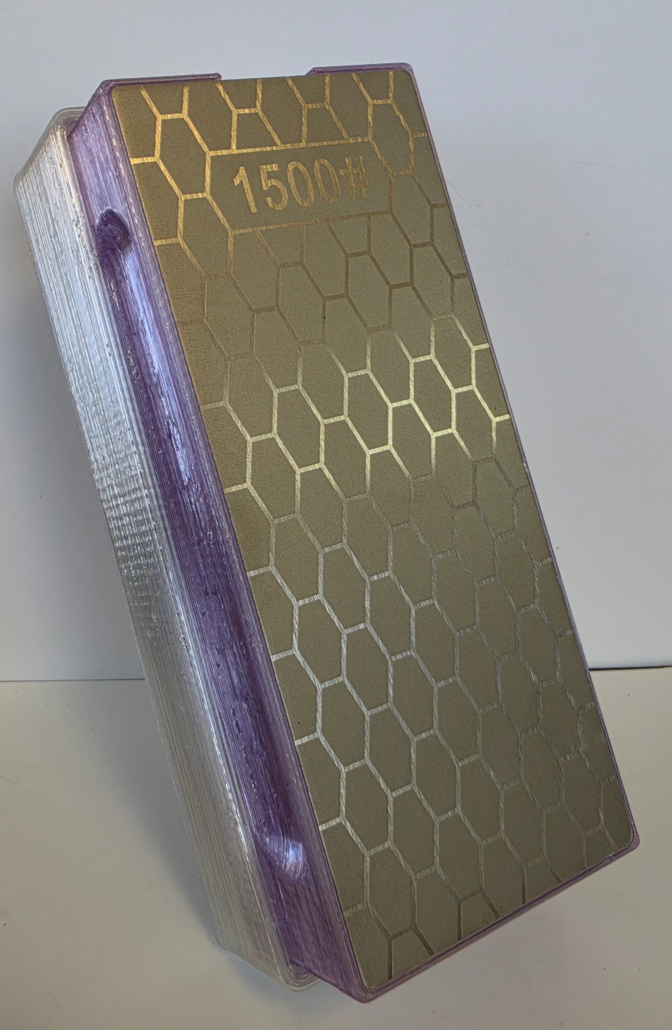 Grandma Patsy translucent purple knife sharpening system with installed 1500 grit plate and translucent-clear base