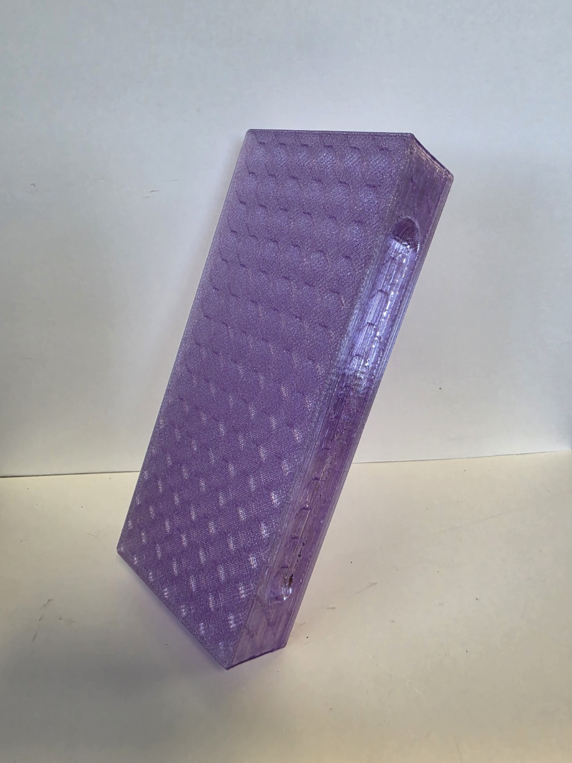 Bare back side of translucent purple Grandma Patsy holder