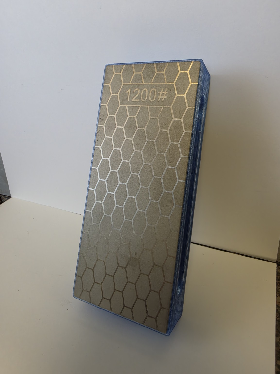 Jamesy translucent light-blue sharpener with permanently installed 1200 grit plate