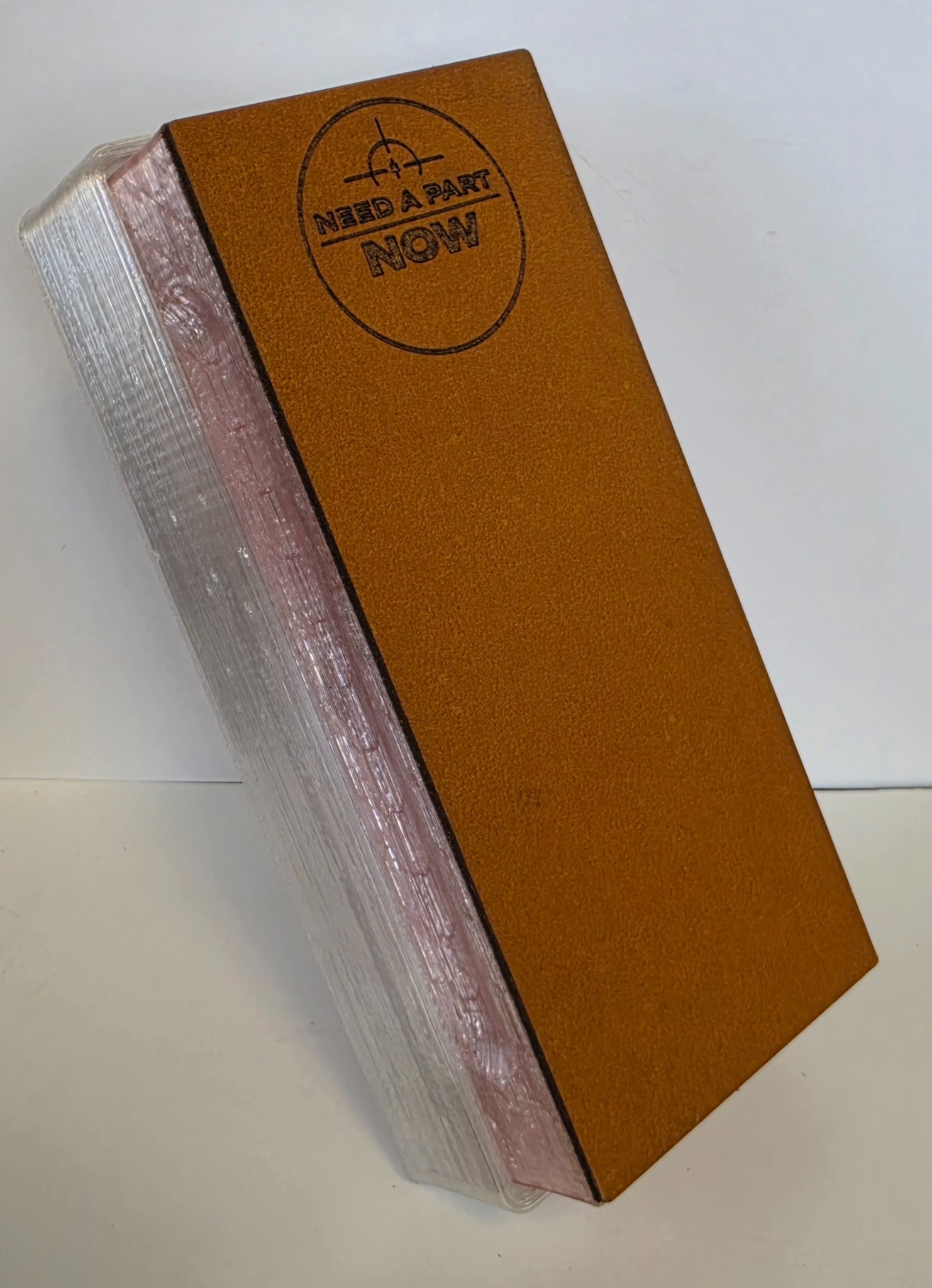 Susie translucent pink knife sharpening system with light-brown buffalo-hide strop and translucent-clear base