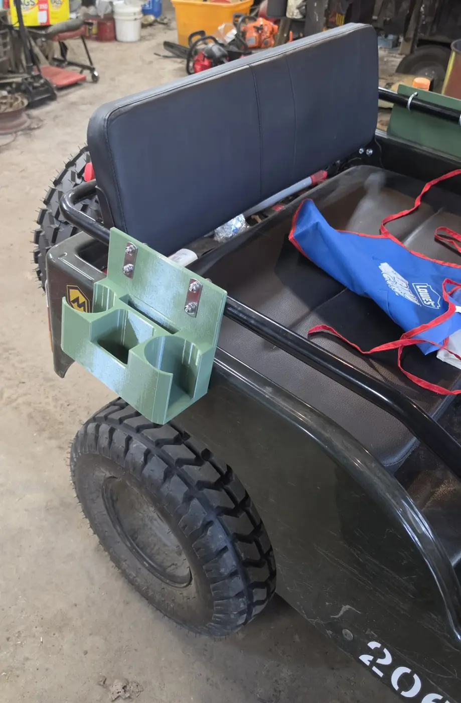 Mini Jeep organizer mounted beside the rear seat